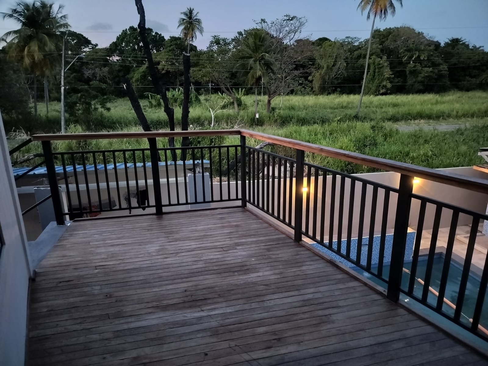Mayaro Beach House outdoor solid teak open air deck at Rachel's Retreat