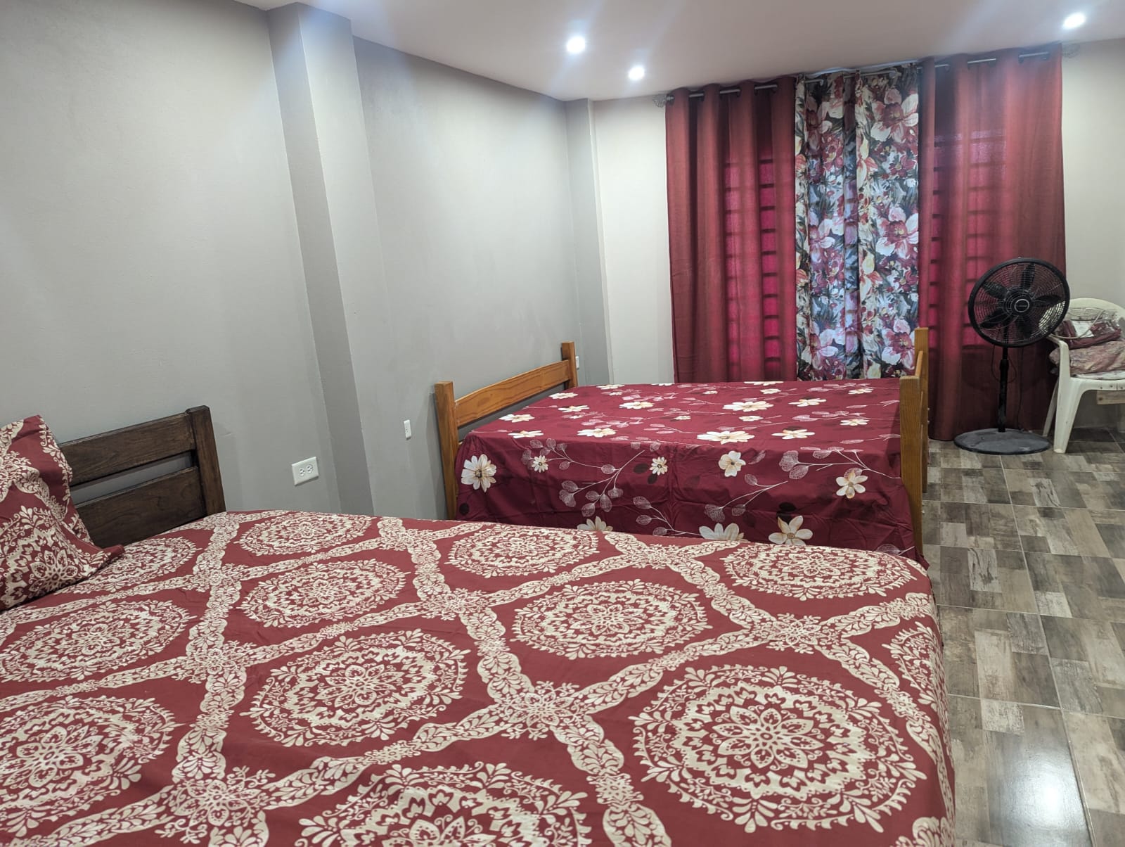 Spacious bedroom near deck at Rachel's Retreat Mayaro Beach House