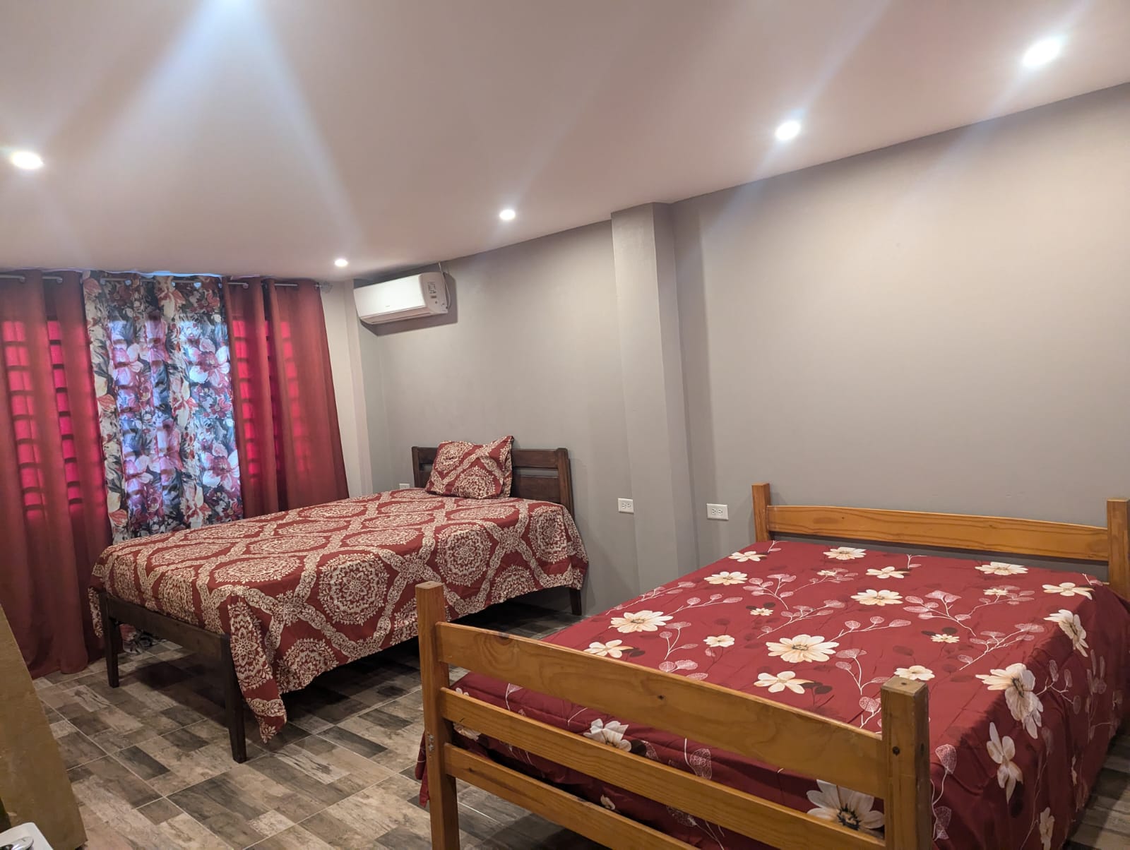 Comfortable downstairs bedroom at Rachel's Retreat Mayaro Beach House